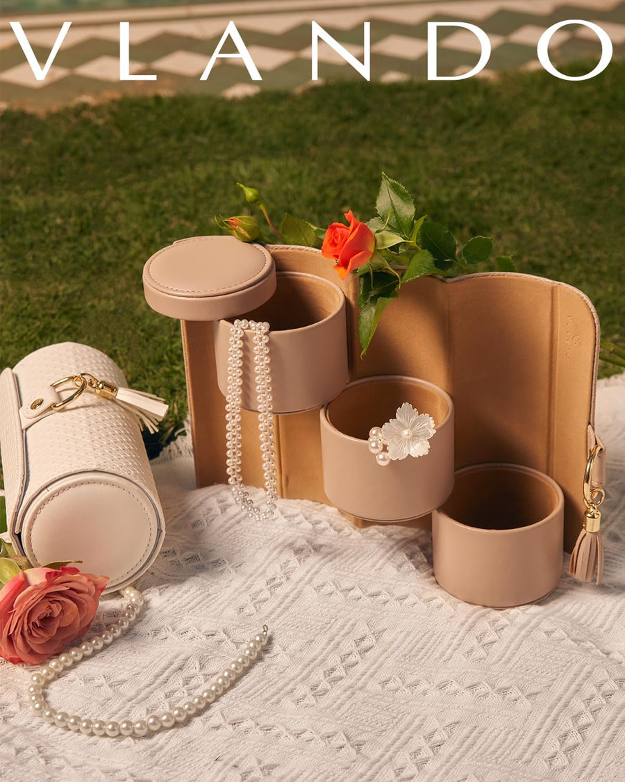 VLANDO tiered travel jewelry case with rotating compartments for pearls, rings, and accessories