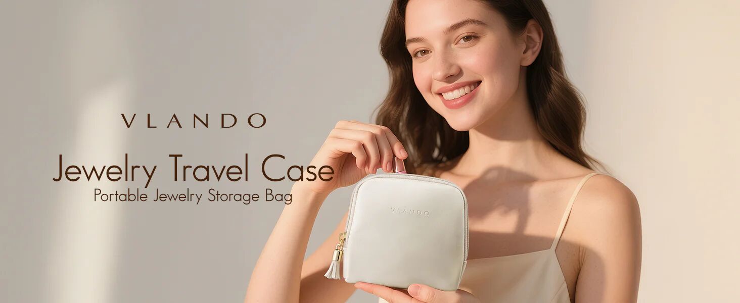 Smiling woman holding a VLANDO portable jewelry travel case.